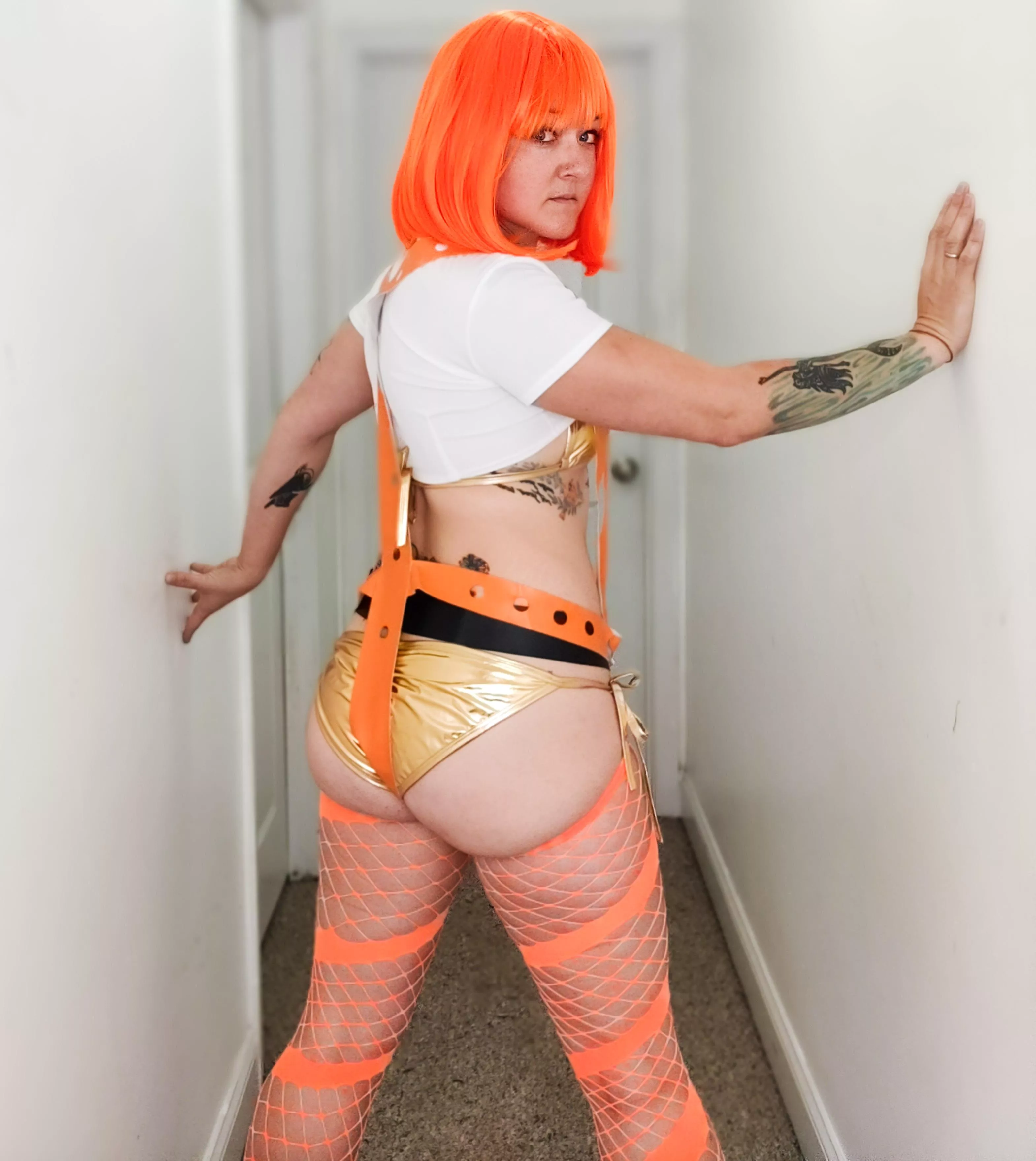 Using these orange fishnets to add my spin on this Leeloo costume! posted by gothic_popsicle