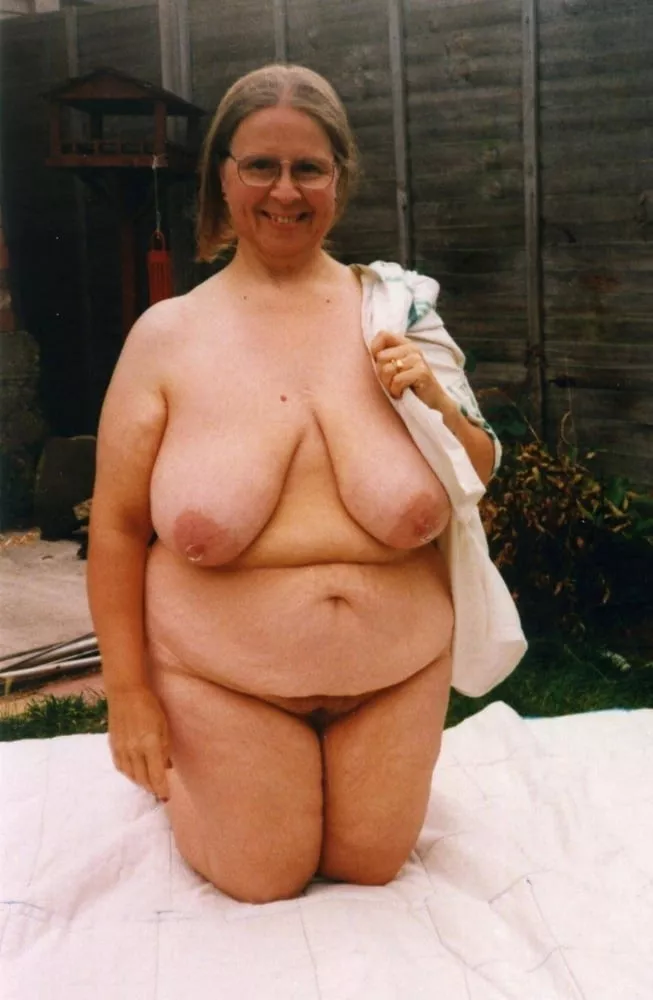 Vintage BBW nudist gettijg ready to lay out in her yard posted by Udderluvr2020