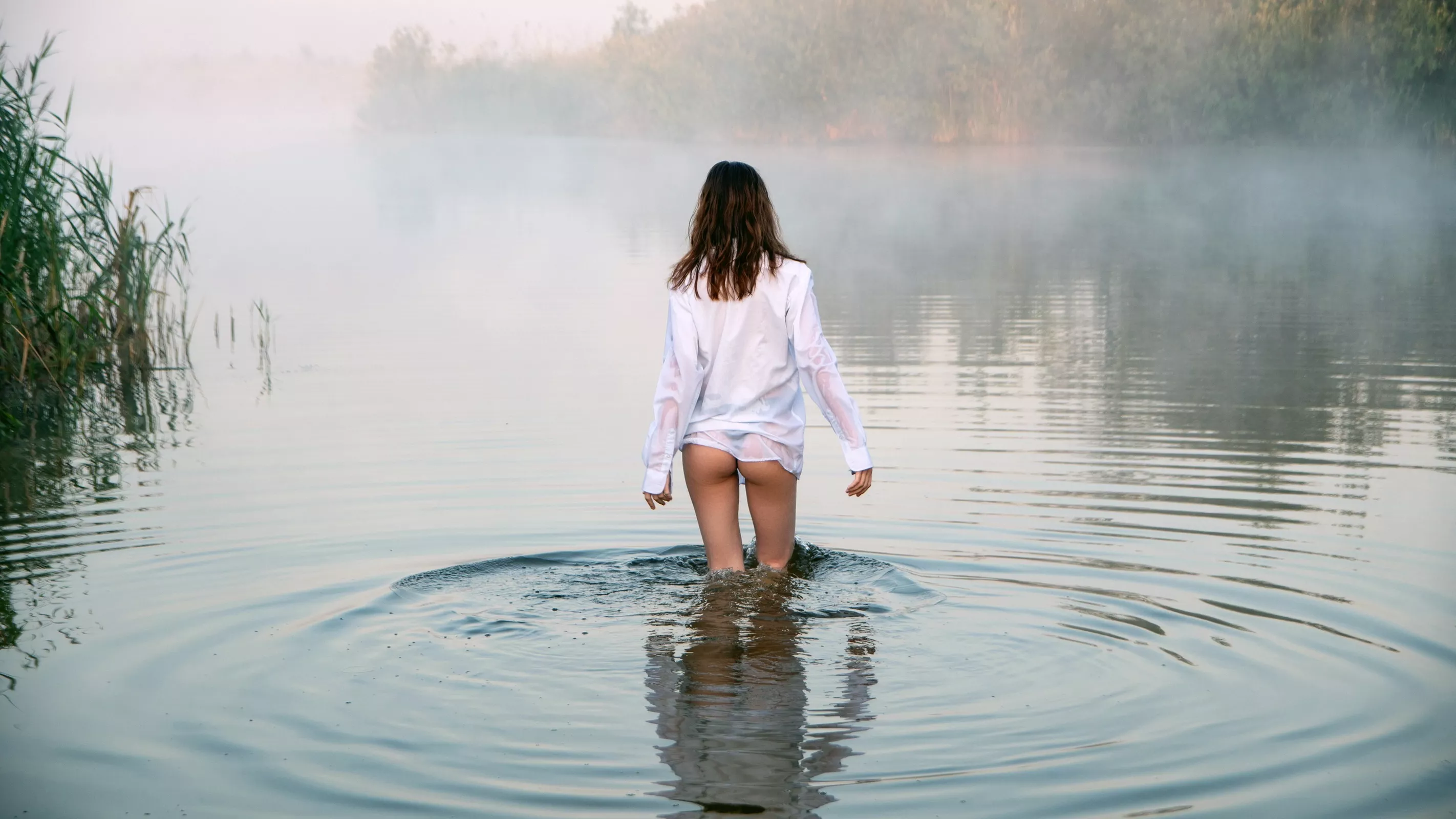 wading through a pond on a foggy day posted by JuliaSeth