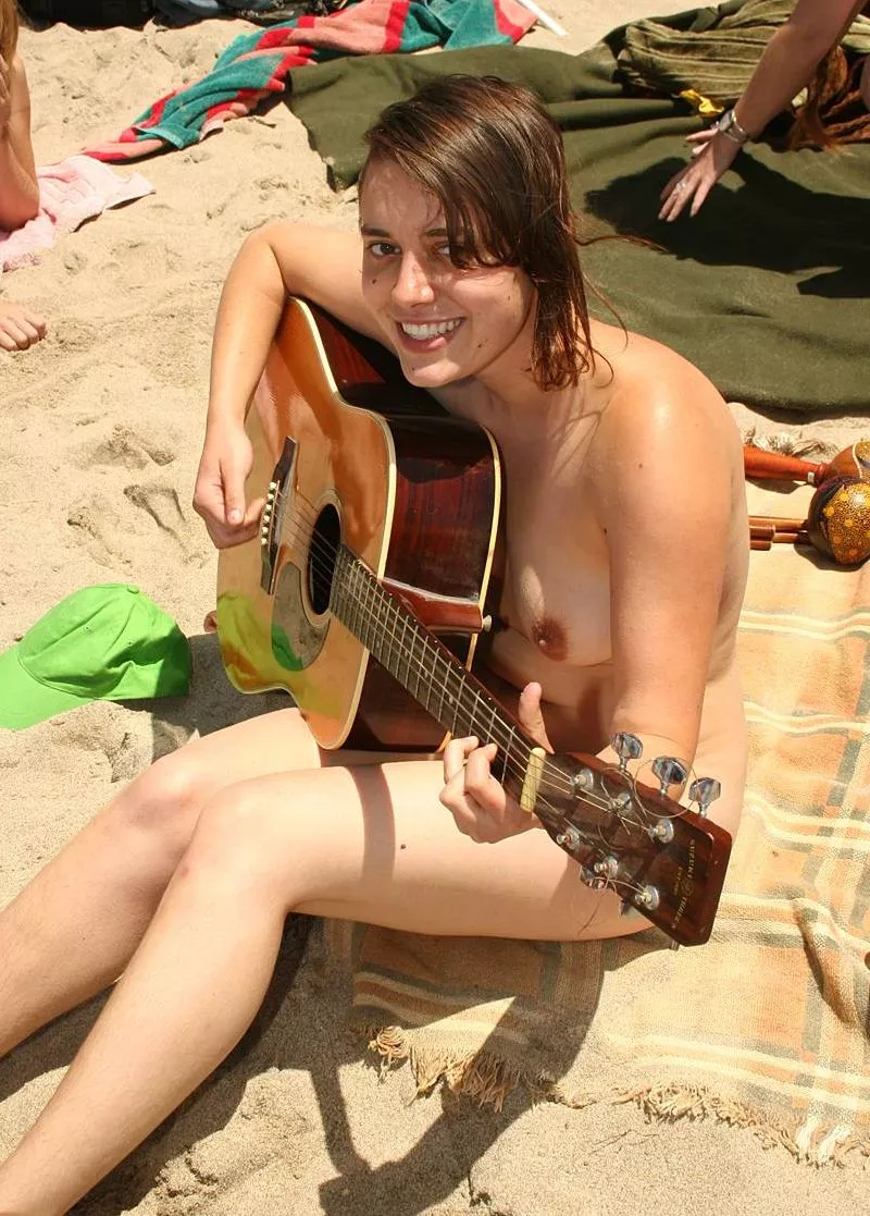 We love guitar players on the beach posted by NaturistPictures