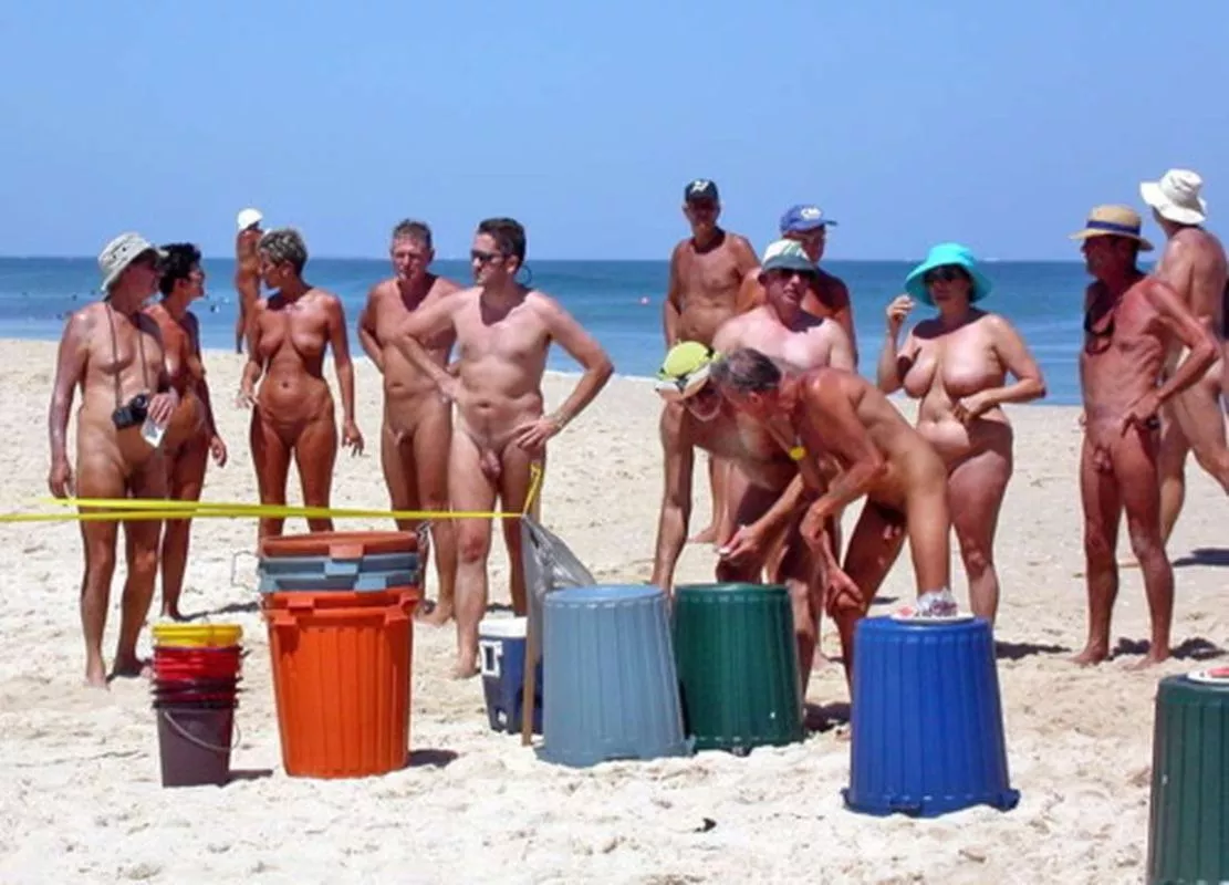 What a crowd of elderly people could be doing with a stack of trash bins? posted by bobettebobqc